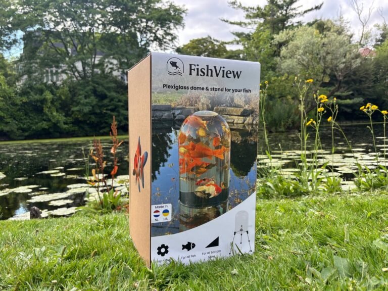 FishView retail box showing the plexiglass pond dome, on the grass next to a garden pond